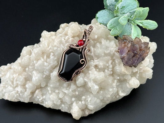 Obsidian coffin pendant